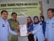 LAPAS WANITA PALEMBANG TERIMA BANTUAN ALAT PRODUKSI PAKAIAN JADI