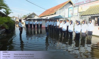 "Tetap Optimis dalam Banjir"