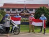 Dukung Program Pemkab Kotim, Lapas Sampit Turut Bagikan Bendera kepada Masyarakat