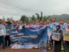 Dari Pintu ke Pintu, Petugas Pemasyarakatan Serahkan Bansos lewat Touring Peduli HBP Ke-59