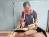 Asah Kreativitas, Warga Binaan Lapas Kotabaru Bikin Miniatur Kapal dari Kayu
