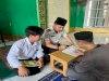 Petugas Lapas Tahuna Bimbing Warga Binaan Belajar Iqra dan Al-Qur'an