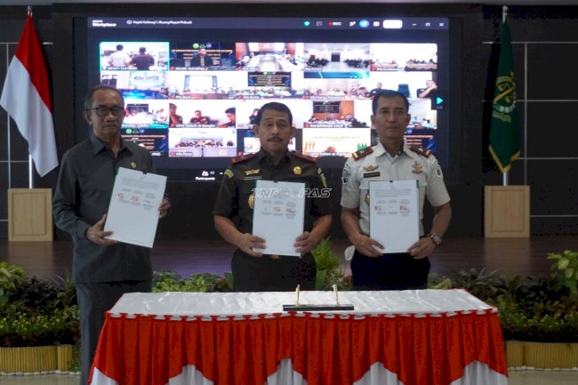 Kanwil Ditjenpas Sulteng Perkuat Sidang Elektronik melalui PKS Tiga Institusi
